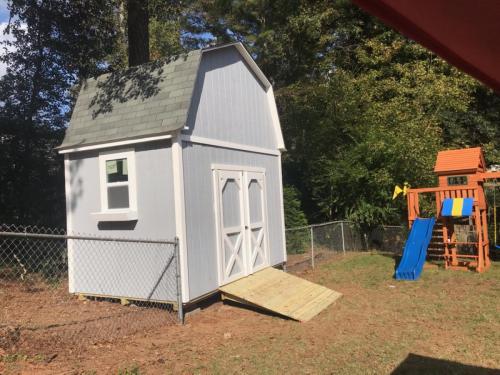 12X8 Asheville with 8' side walls, ramp, and painted.